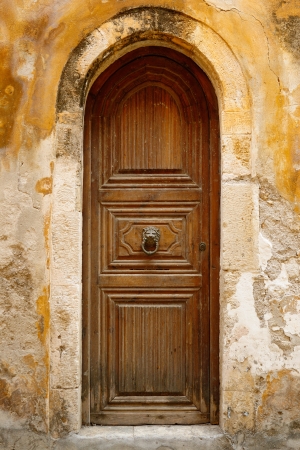 Old wooden door in city of Rethymno, Crete, Greeceの写真素材