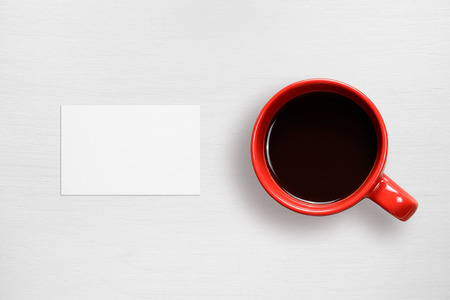 Business card mock-up and coffee cup top viewの写真素材