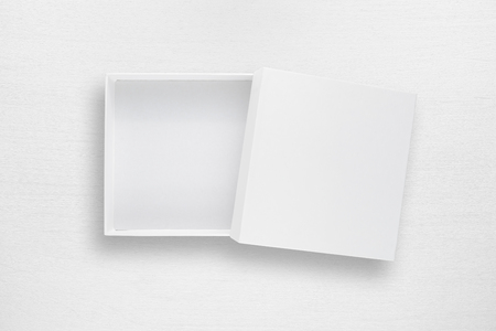 Cardboard box with cover on white table top viewの写真素材