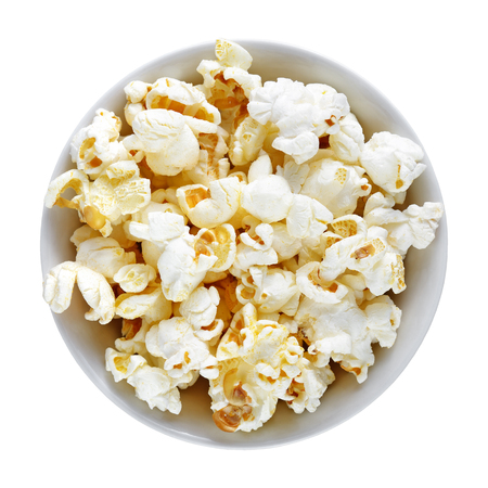 Popcorn in bowl isolated on white backgroundの写真素材