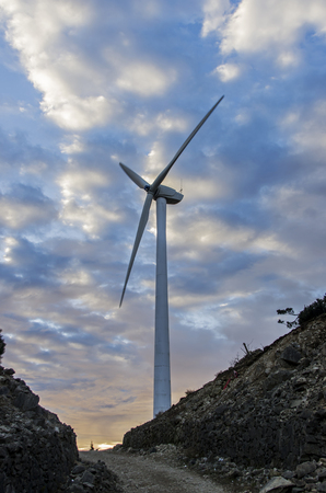 Wind turbine at sunriseの写真素材