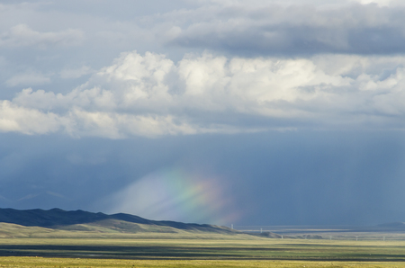 Grassland with blue skyの写真素材