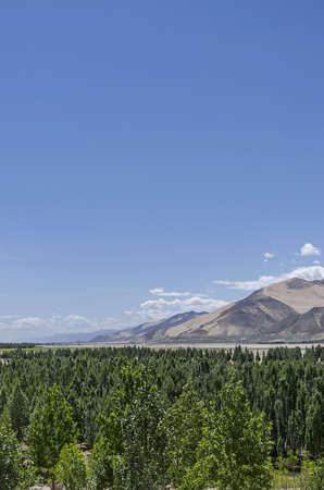 Dangerous mountain road at Ladakh India with view of scenic landscape and Himalayan mountain ranges.の写真素材