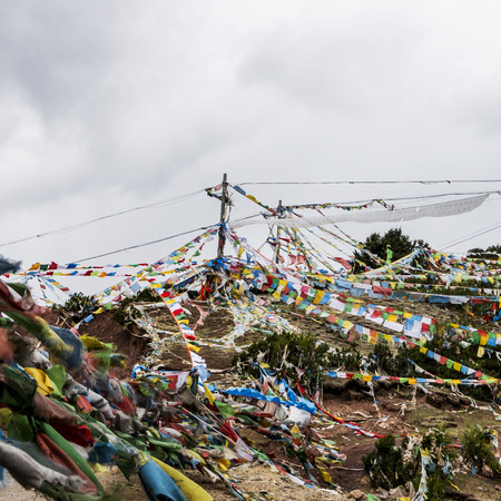 Tibetan prayer flags blowing in the wind