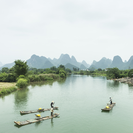karst mountains are visible on blue sky background on summer sunny day.の写真素材