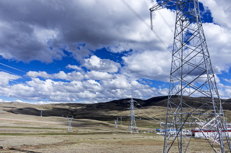 High-voltage electric wires under the blue sky