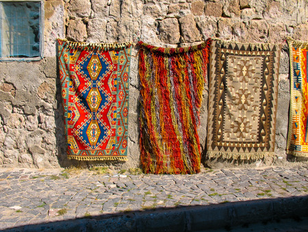 Colorful handmade Turkish carpets on the street, Turkeyの写真素材