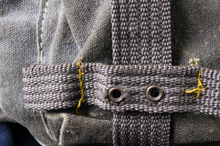 closeup of a pockets and fittings in the black backpack