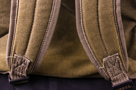 closeup of a pockets in the brown backpackの写真素材