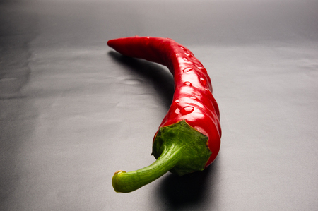 Red chili pepper on a black backgroundの写真素材