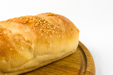 whole wheat bread on on a chopping Board
