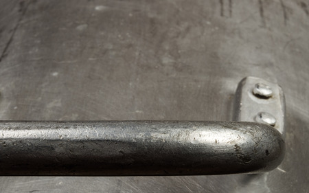 texture of the old aluminum surface with rivets, corrosion, scratches, and dentsの写真素材