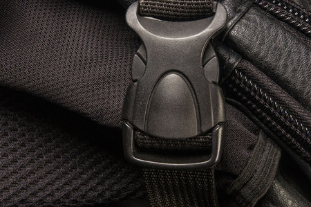 closeup of the fittings and seams on black leather hand bagの写真素材