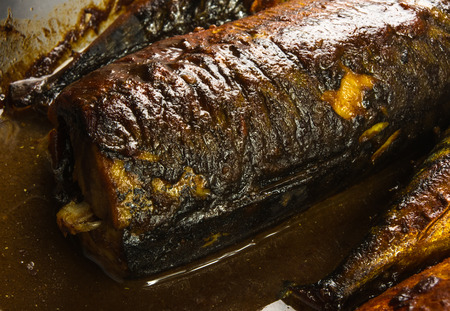 Mackerel in marinade, baked in a glass containerの写真素材