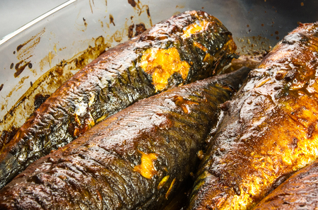 Mackerel in marinade, baked in a glass containerの写真素材