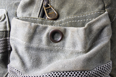 closeup of the fittings and seams in the brown backpack