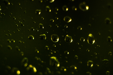 raindrops on the window glass, toned, close upの写真素材