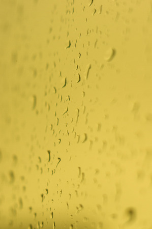 raindrops on the window glass, toned, close upの写真素材