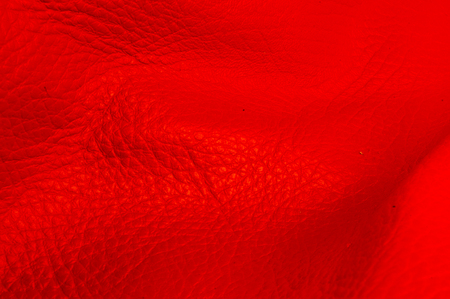red natural leather texture background, closeup, macroの写真素材