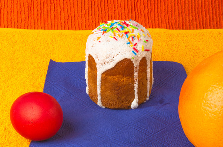 Kulichi, traditional Russian Easter cake with icing and dyed eggs