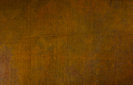 Aged copper plate texture, old worn metal background, close up.の写真素材