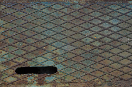 Texture of old shabby rusty metal surface. Cracks, scrapes and of colored paint.