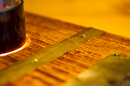 Light fixture handmade in vintage style, wooden case and radio tube, copper finish, led lamp, elements close upの写真素材