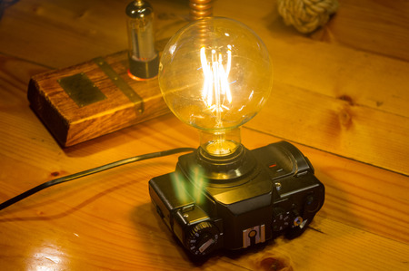 Light fixture handmade in vintage style, retro film SLR camera case, led lampの写真素材