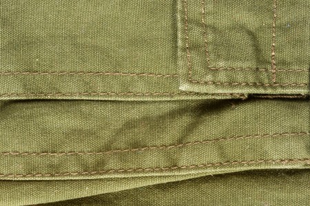 clothing items washed cotton fabric texture with seams, macro, close-up