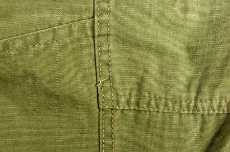 clothing items washed cotton fabric texture with seams, macro, close-up