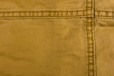 clothing items washed cotton fabric texture with seams, macro, close-up