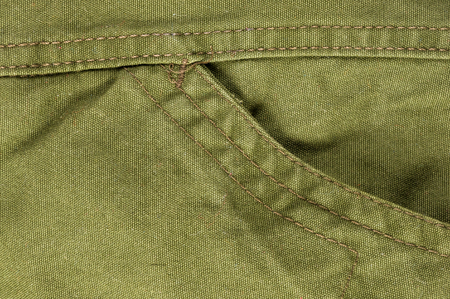 clothing items washed cotton fabric texture with seams, macro, close-up