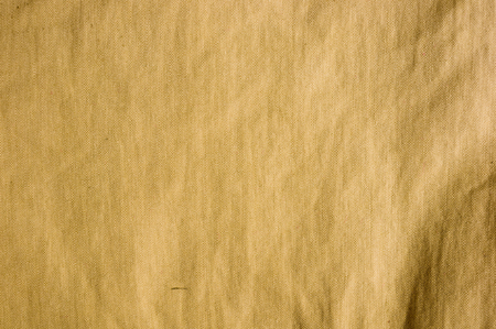 clothing items washed cotton fabric texture with seams, macro, close-upの写真素材