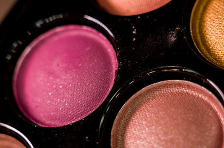 Women's make-up, decorative cosmetics - colorful eyeshadow palette, close-upの写真素材