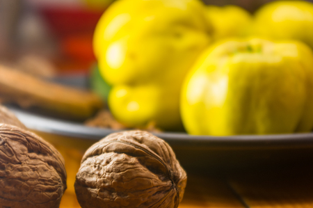 Whole walnuts on a wooden table, still life, close-upの写真素材