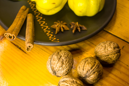 Whole walnuts on a wooden table, still life, close-upの写真素材