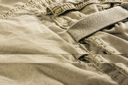 clothing items washed cotton fabric texture with seams, macro, close-up
