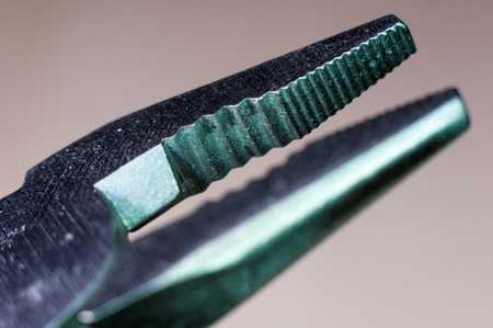 elements small foldable steel multitool, closeup, macroの写真素材