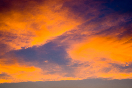 Landscape with dramatic light - beautiful golden sunset with saturated sky and clouds, peaceful...