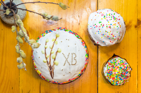 Kulichi, traditional Russian Easter cake with icing and dyed eggs