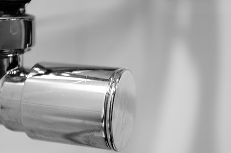 Elements of the bathroom interior-modern design, chrome details, parts of the shower cabin, plumbing.の写真素材