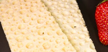 fresh strawberry and diabetic diet crunches - crispy waffle bread from wheat, texture close-up