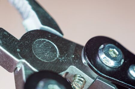 elements small foldable steel multitool, closeup, macro