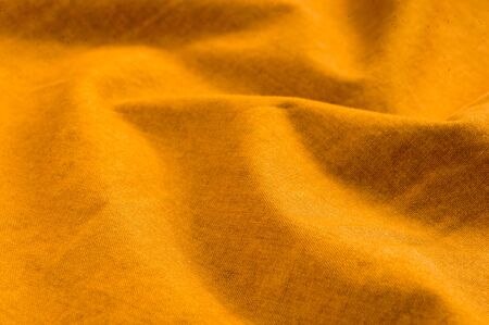 clothing items washed cotton fabric texture with seams, clasps, buttons and rivets, macro, close-upの写真素材