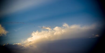 Landscape with dramatic light - beautiful golden sunset with saturated sky and clouds, peaceful...