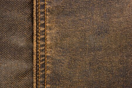 clothing items washed cotton fabric texture with seams, clasps, buttons and rivets, macro, close-upの写真素材