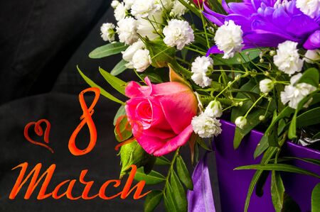 Holiday card - beautiful gift bouquet of various blooming bright colorful decorative summer flowers, holiday greetings, handwritten inscription with a brush 8 march, greeting lettering.の写真素材