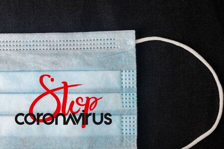 Background for news about the novel coronavirus COVID-19 - protective medical masks, thermometer and text Coronavirus COVID-19. Chinese coronavirus outbreak, Middle East respiratory syndrome coronavirus.の写真素材