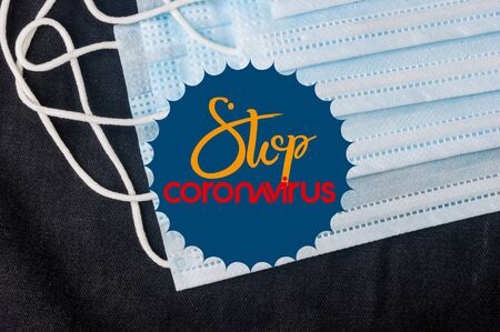 Background for news about the novel coronavirus COVID-19 - protective medical masks, thermometer and text Coronavirus COVID-19. coronavirus outbreak, Middle East respiratory syndrome coronavirus.の写真素材