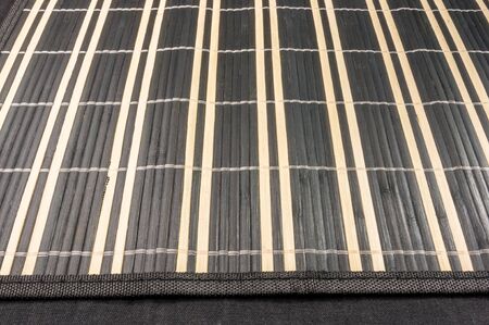 brown bamboo Mat - stand food, close-up, macro, black background